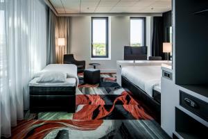 Fletcher Wellness-Hotel Leiden的一间客房