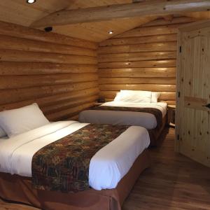 哈迪港口小屋汽车旅馆客房内的一张或多张床位