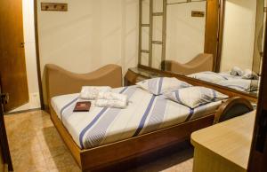 Hotel Ordenes (Adult Only)客房内的一张或多张床位