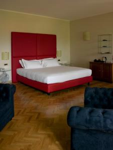 黎莱斯佛兰切柯尔塔酒店客房内的一张或多张床位