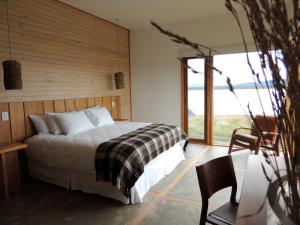 Hotel Simple Patagonia客房内的一张或多张床位