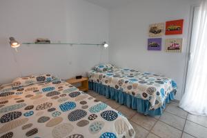 Los Cabosos 40, Pasito Blanco, Gran Canaria客房内的一张或多张床位