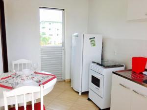 Moradas da Bibi的厨房或小厨房