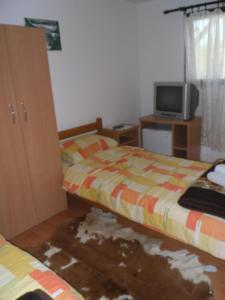 艾特诺克姆普勒克斯卡皮塔昂米斯恩布瑞格酒店客房内的一张或多张床位