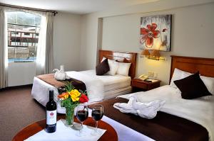 Casona Plaza Hotel Puno客房内的一张或多张床位