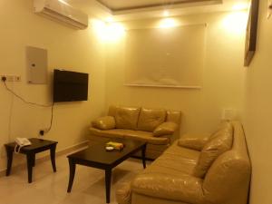 Lara Al Jawf Hotel Apartments的休息区