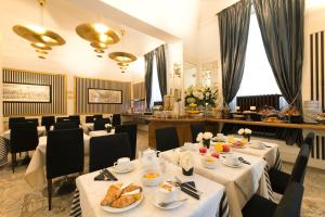 Hotel De La Pace, Sure Hotel Collection by Best Western餐厅或其他用餐的地方