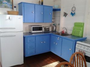 斯卡伯勒onelovecottagetobago upstairs apartment的相册照片