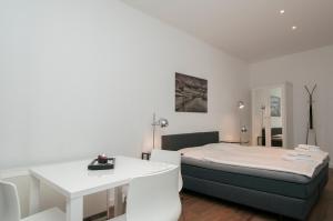 Gästezimmer an der Elbphilharmonie contactless Check in客房内的一张或多张床位
