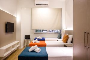 伊帕内玛殷乔伊公寓式酒店客房内的一张或多张床位