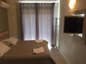 阿尔沃雷多港旅馆客房内的一张或多张床位