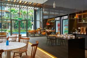 Oasia Residence Singapore by Far East Hospitality餐厅或其他用餐的地方