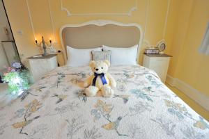 法式棉花糖民宿客房内的一张或多张床位