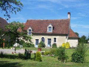 贝莱姆Maison d'Hôtes Les Après的白色砖屋,有红色屋顶