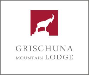 萨姆瑙恩Grischuna Mountain Lodge的山间小屋的标志,上面有山羊