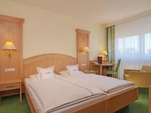 海德尔堡酒店客房内的一张或多张床位
