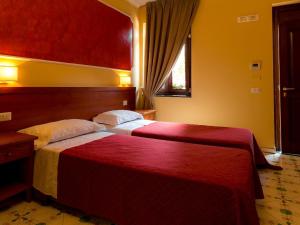 庞贝佛图纳村旅馆客房内的一张或多张床位