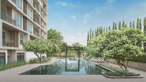 Si Maha Phot304花园酒店的建筑前带游泳池的庭院