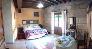 Antigua Posada, Valle del Jerte客房内的一张或多张床位
