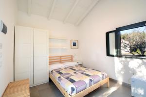Villaggio Turistico Elea客房内的一张或多张床位
