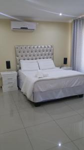 Munisa Guest House客房内的一张或多张床位