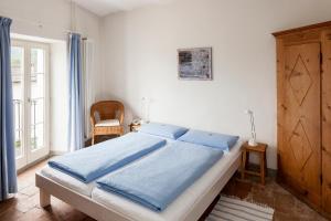 圣斯特法诺酒店客房内的一张或多张床位