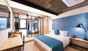 Delight Hotel Jamsil客房内的一张或多张床位