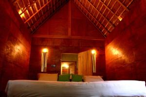 Bedda Eco Cottages客房内的一张或多张床位