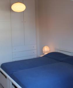 Appartamento Grado 5客房内的一张或多张床位