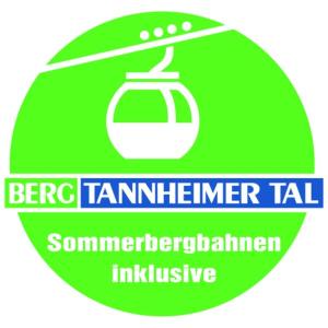 坦海姆Apart & Pension Wassermann inklusive Sommerbergbahnticket的上面有茶壶的绿色标志