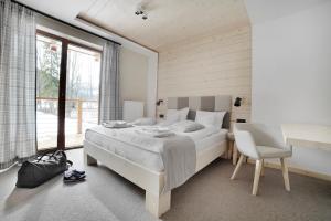 VILLA NOSAL - Zakopane客房内的一张或多张床位