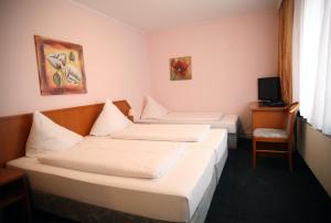 拉法耶特酒店客房内的一张或多张床位