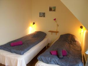 Klintholm Bed & Breakfast & Bistro客房内的一张或多张床位