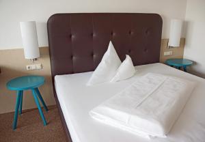 博格纳兰德加斯霍夫酒店客房内的一张或多张床位