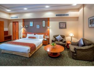 波斯湾郁金香酒店客房内的一张或多张床位