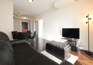 Executive Furnished Properties - Square One Mississauga的休息区