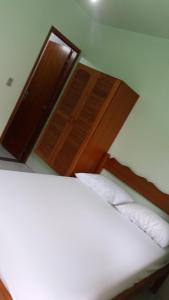 Pousada da Nalva客房内的一张或多张床位