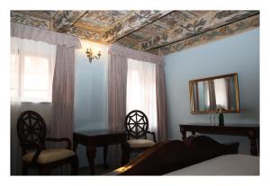 布拉格黄金时代酒店客房内的一张或多张床位