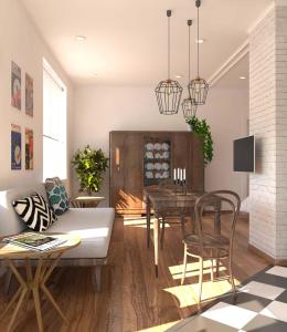 塔什干艺术一室公寓的一间带桌子的客厅和一间餐厅