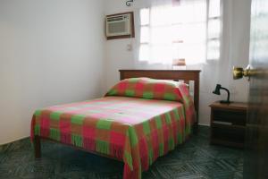 Casa Jaguar客房内的一张或多张床位
