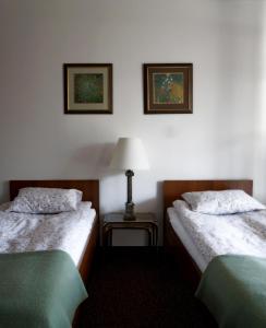Dworek Aleksandria客房内的一张或多张床位