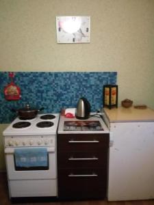 Always at home - Apartments at Klimasenko 11 block 9的厨房或小厨房