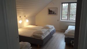 STF Möja Vandrarhem客房内的一张或多张床位