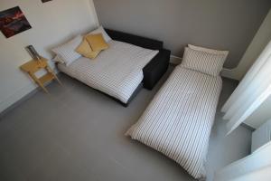 Interno24 Apartment客房内的一张或多张床位