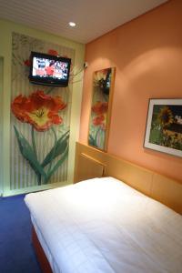 维旺迪酒店客房内的一张或多张床位