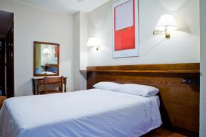 伊比尔兹酒店客房内的一张或多张床位