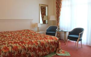 乌泽多姆宫殿酒店客房内的一张或多张床位