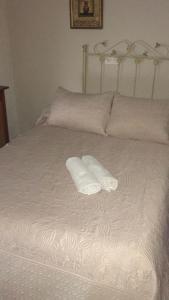 圣米格尔旅馆客房内的一张或多张床位