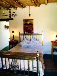 Finca Huayrapuca客房内的一张或多张床位