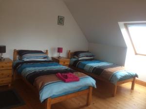 Beach View Heights, Dugort, Achill Island客房内的一张或多张床位